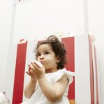 Little girl eating cake