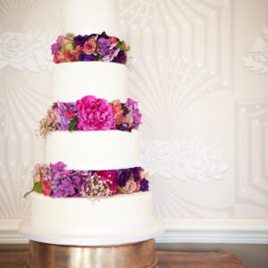 Fresh flowers on wedding cake