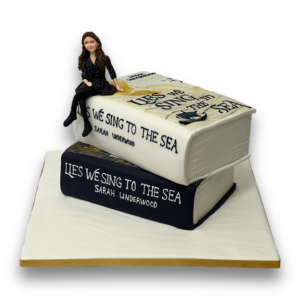 Books with sugar model lady cake