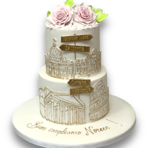 Roses and building silhouette cake