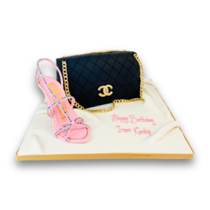 Chanel handbag and pink shoe cake