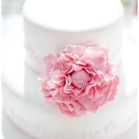 Wedding cake with pink peony flower