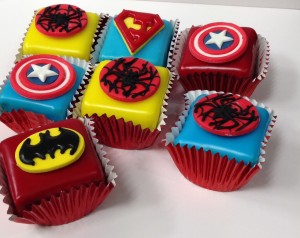 Superhero fondant fancies dessert table