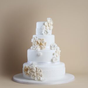 timeless-wedding-cake-4-tier-flowers-buttons