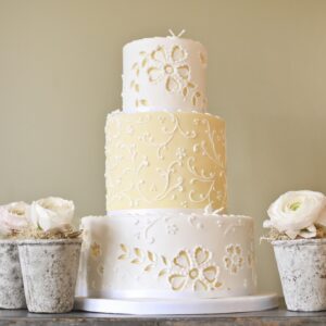 yellow lace cake and stone flowers